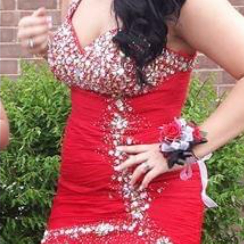 Red prom dress. Worn only once. Been put up in its bag since it was last worn